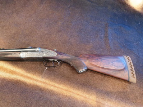 rifle express paralelo Victor Sarrasqueta en el magnífico y peculiar calibre 303 british , preciosos y 01