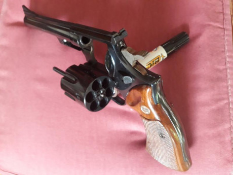 Cambio revolver Astra 45 LC ctg en Libro Coleccionista por arma en 22Lr tambien en Libro preferentemente 02