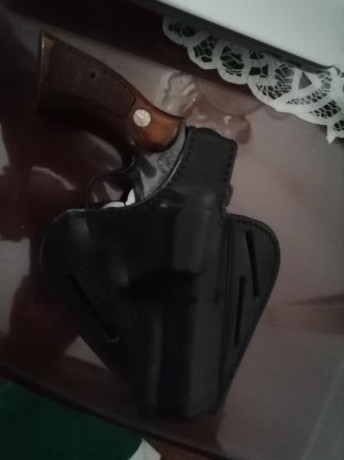 38 especial llama perfecto estado vendo por cambio de arma, rebaja a 80 euros regalo dos fundas y caja 02