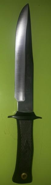 Cuchillo marca Muela acero al carbono, 21'5 cm de hoja, con anagrama de ARMAS Y MUNICIONES, en perfecto 11