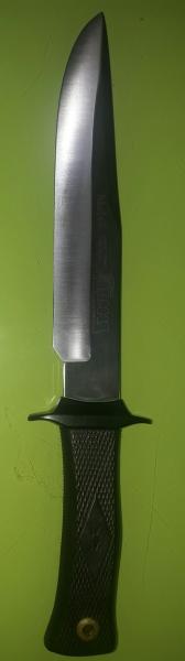 Cuchillo marca Muela acero al carbono, 21'5 cm de hoja, con anagrama de ARMAS Y MUNICIONES, en perfecto 11