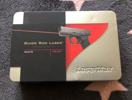 Vendo puntero láser para Glock (modelos 43, 43X o 48). 

Puntero integrado en la guia del muelle recuperador. 01