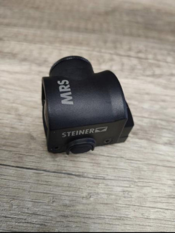 Punto rojo steiner MRS como nuevo. Enlace con características. 
https://www.steiner.de/de-de/es_ES/cat/productos-10986/shooting-10951/Sights-10917/Micro-Reflex-Sight-10927/
250€ 11