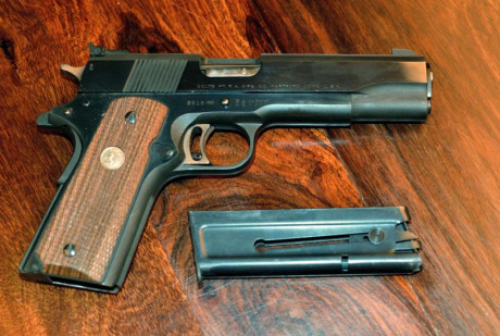 hola pongo a la venta mi COLT 1911 Gold Cup National Match MID RANGE del calibre 38 WC, que es la pistola 00