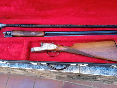 Se vende escopeta paralela marca setter,de dos y una,71 de cañón, expulsora, válvula de gases,estado muy 02