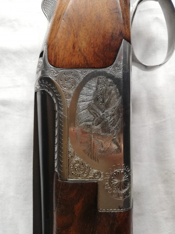 Vendo escopeta superpuesta Browning B25 modelo B2G del calibre 12/70 ánima de 18.2 longitud de los cañones 01