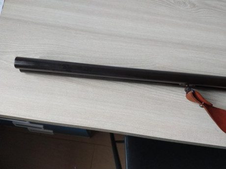 a la venta una paralela de perrillos calibre 12/70, Ignacio Ugartechea, lleva triple cierre Purdey,cañones 21