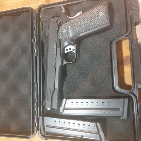vendo bull 1911  en calibre  9mm  cañon  bull barrel   totalmente nueva a tirado 2 cajas de municion para 01