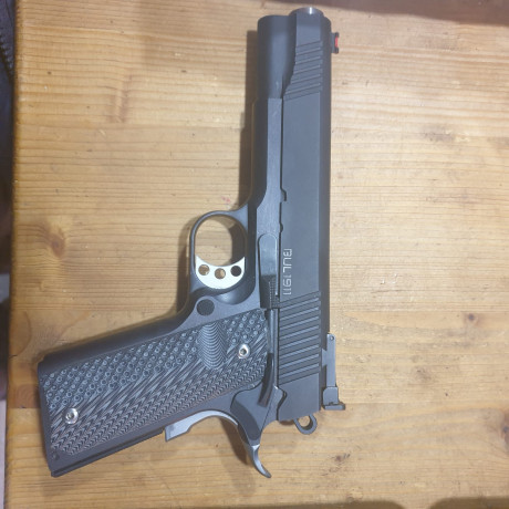 vendo bull 1911  en calibre  9mm  cañon  bull barrel   totalmente nueva a tirado 2 cajas de municion para 00