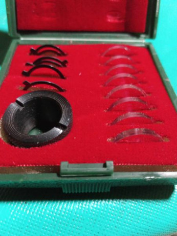 Se vende este juego de anillos transparente con muy poco uso y aros metálicos para miras abiertas de la 00