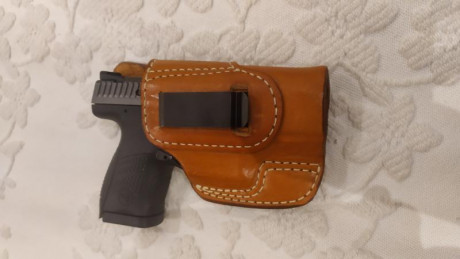 Vendo funda de cuero marrón de alta calidad para portar arma por el interior del pantalon con sujeción 00