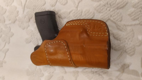 Vendo funda de cuero marrón de alta calidad para portar arma por el interior del pantalon con sujeción 12