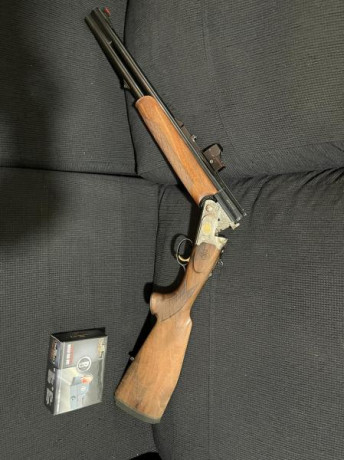 Un amigo vende escopeta superpuesta bettinsoli slug cañón liso de 55 cm , expulsora, selector de tiro 01