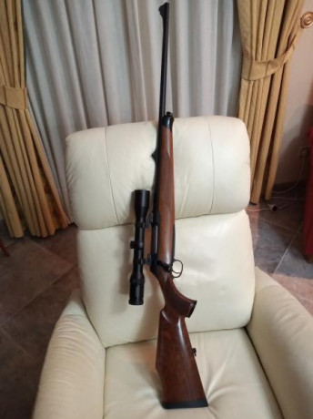 Vendo rifle Sauer 202 en calibre 8x68s ,bases y monturas Appel y visor Swarovski 1.5-6x42,tiene maderas 01