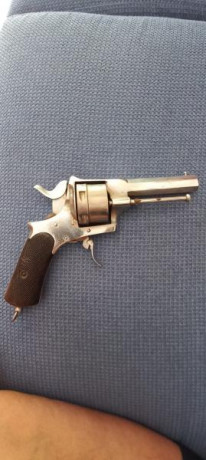 Hola a todos 
Alguien sabe decirme que revolver es este 
Que valor puede tener 
Y porque no tiene marcajes 02