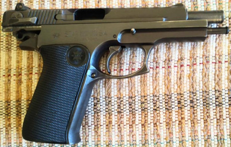 Se vende Star 30-M, estado impecable. Tiene cuatro cargadores y maletín. 250 euros más gastos de envío 01