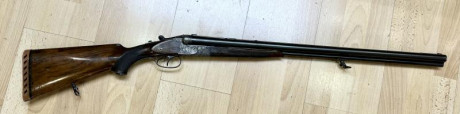 Vendo rifle drilling alemán fabricado por Jos Zeller. Los cañones superiores son en cal.12 y el inferior 00