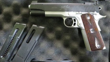 Para comprar un modelo superior, vendo esta Kimber bitono 1911 cal 22 LR, en perfecto estado, con su estuche, 01