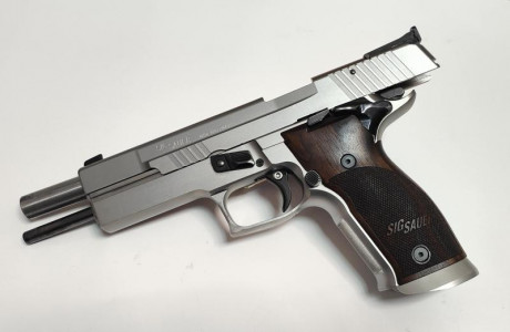 Vendo Sig Sauer P226 X-SIX 9mm Para., Inox, maletin original y manual, con los 2 cargadores que venian 11