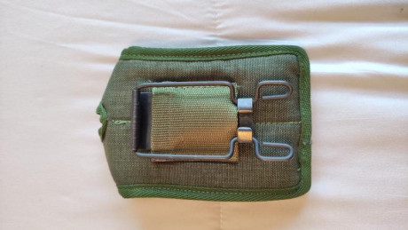 Vendo funda de lona, en color verde oliva, para pistola Beretta 92 (creo que es una funda universal que 11