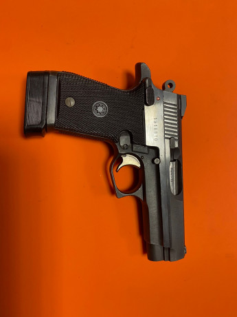 Se vende pistola de la marca Star modelo FIRESTAR M43, en color negro, con caja original y dos cargadores. 00