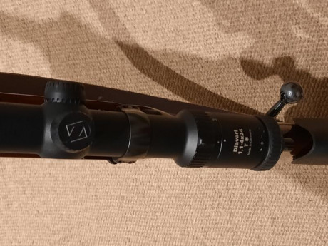Rifle de cerrojo, caja larga en buen estado, carrillera regulable, monturas apel, visor zeiss con tubo 00