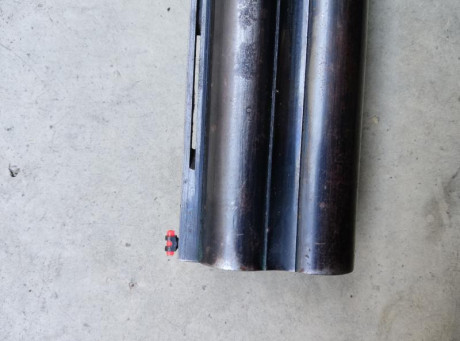Vendo escopeta Lamber superpuesta cañón de 70cm con punto rojo, está usada pero funciona perfectamente,tiene 00
