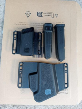 Vendo 2 cargadore para glock 
1 de 10 y 1 de 15 
1 porta cargador de 1
funda para glock.todo original 02