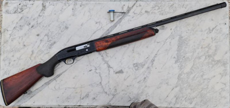 Escopeta de repeticion cal. 12, Beretta A302, con polichoques y llave, buen estado general y funciona 01