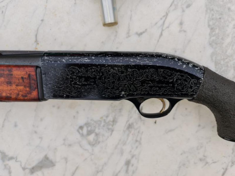 Escopeta de repeticion cal. 12, Beretta A302, con polichoques y llave, buen estado general y funciona 00