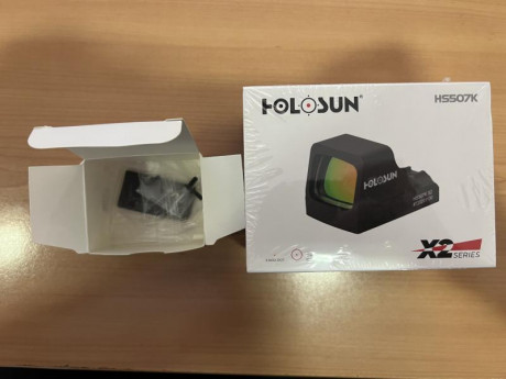 Se vende visor holosun 507k X2 junto con la placa adaptadora de holosun para poder montarlo en Glock con 00