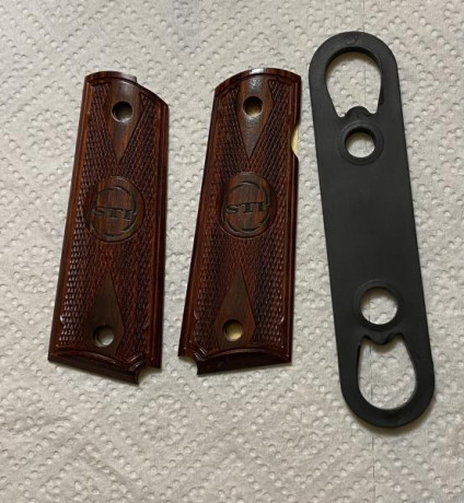 Vendo pistola STI modelo Trojan 1911-5 pulgadas, calibre 9mm.
Estado impecable, cargador original, 5 cargadores 02