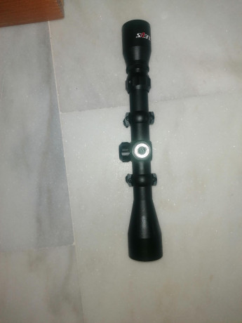 Mira telescópica 3-9 x 40 marca Zeus
Retícula en Forma de Cruz 1/4MOA
 Amplio Alivio Ocular Adapta a 20/22mm
Diámetro 01