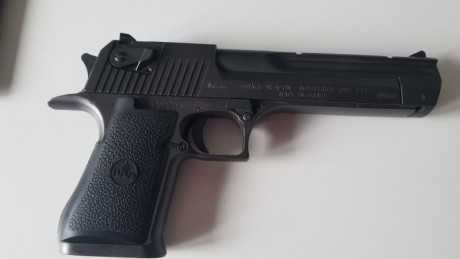 Buenas tardes

Pongo a la venta una DESERT EAGLE en calibre 44 MAG con cañón adicional en calibre 357 02