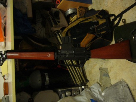 un m16 en cal. 22 con cargador de 15 tiros, que se le aplicara o no al final,,, lo del cargador es para 90