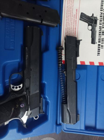 Pongo a la venta mi pistola 1911 Springfield calibre del 9 y carro del 45 acp marca llama en buen estado 02