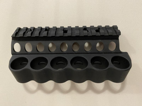 Portacartuchos MESA TACTICAL para BENELLI M4 SUPER 90, para 6 cartuchos. 
Como nuevo.
 100 € envio incluido. 02