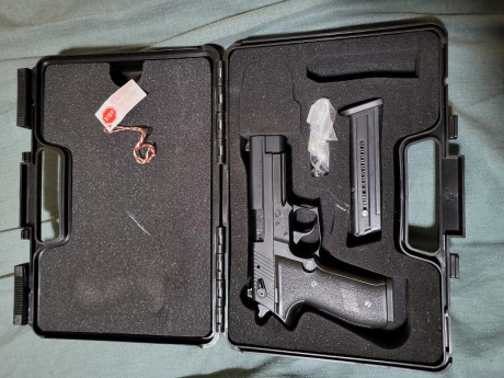 Vendo Sig sauer mosquito cal 22lr de 2023 con su caja y dos cargadores esta nueva solo disparado en dos 02