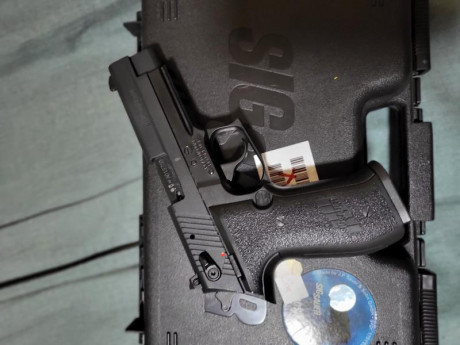 Vendo Sig sauer mosquito cal 22lr de 2023 con su caja y dos cargadores esta nueva solo disparado en dos 00