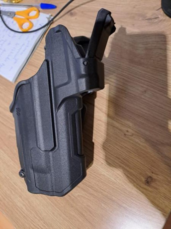 Vendo funda blackhawk t-series lb20 para glock 17, 19, 22, 45 con linterna tlr1 y tlr2, además de holografico 00