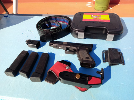 Buenas tardes por no usar vendo GLOCK 34 3ª gen 3 cargadores, funda de IPSC, cinturon doble maletin original 00