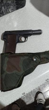 Se vende pistola 9 corto purito un cargador   una funda en buen estado de vende dais de recarga +casquillos 02