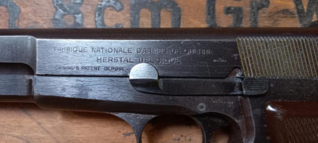 Este fantástica FN HP de producción de 1944 serie b con cachas de bakelita  esta inscrito en mi libro 02