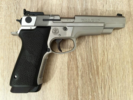 Se vende esta pistola SW modelo 5906 Target Champion, Performance Center, en 5 pulgadas de cañon, y en 02
