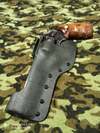 Revolver smit wesson modelo 14-5 6" y calibre 38 spl con 11 cargadores de pla y 9 fundas , funda 01