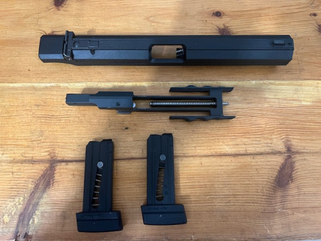 Buenas tardes vendo kit del calibre 22 de pistola hammerli 280 con dos cargadores, el cual se encuentra 02