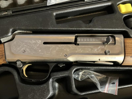Vendo esta repetidora , impecable, con maletín 3 choques documentos, candado de gatillo, tal como viene 31