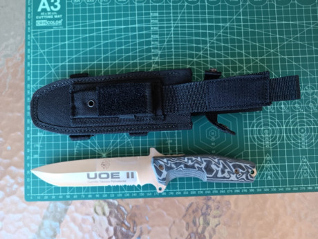 UOE II   de J&V  
Cuchillo táctico polivalente 
Hoja de acero inoxidable MoVa-58 de 160 mm. de largo.
Espesor 21