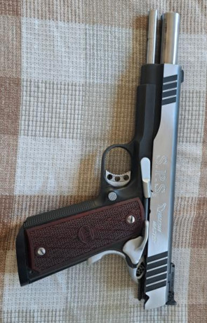Un saludo 
Vendo mi pistola SPS FALCON MASTER duotone del 
9mm y cañón de 6 pulgadas. El arma está completamente 01