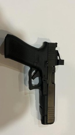 Vendo Glock 34 5ª Generación.  Comprada en Junio en Armería Álvarez de Madrid. Soy el segundo propietario. 10